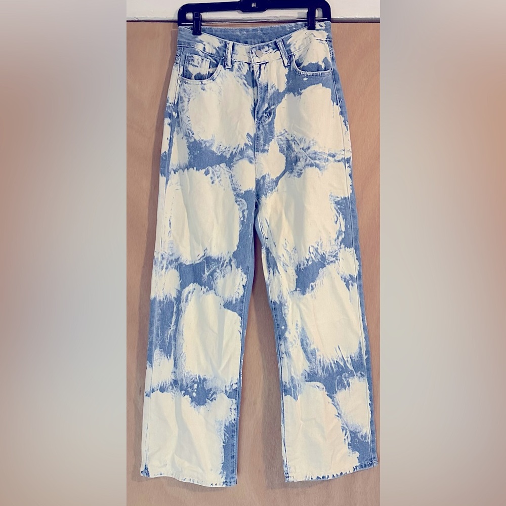 Acid wash denim blue jeans